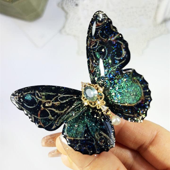 Pasador mariposa retro tridimensional polarizado