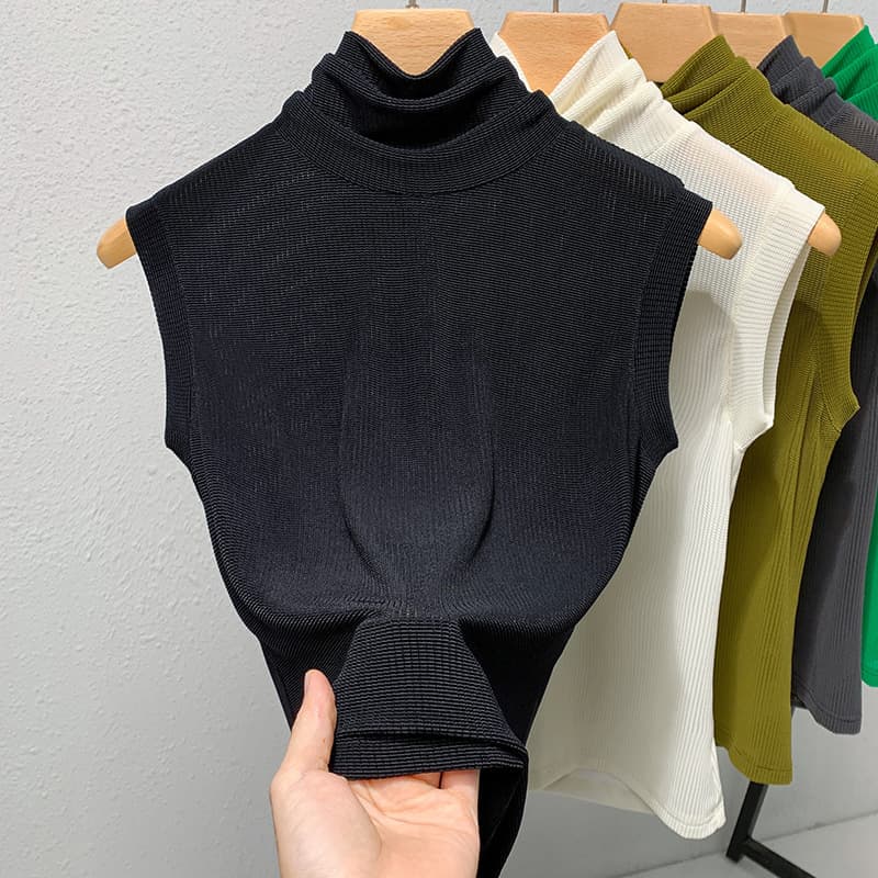 Blusa mujer cuello polera sin mangas ceñida ajustada