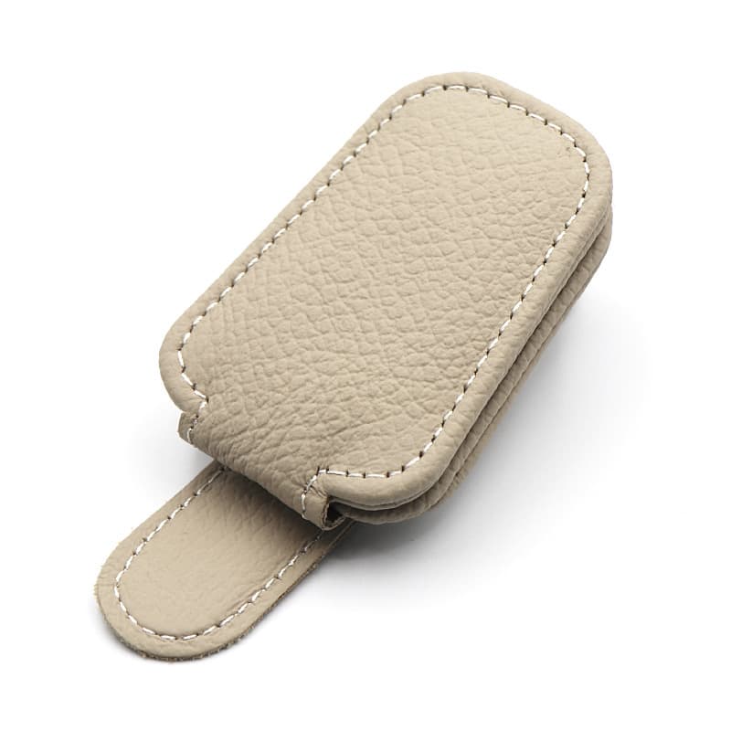 Soporte adhesivo para gafas en parasol del auto