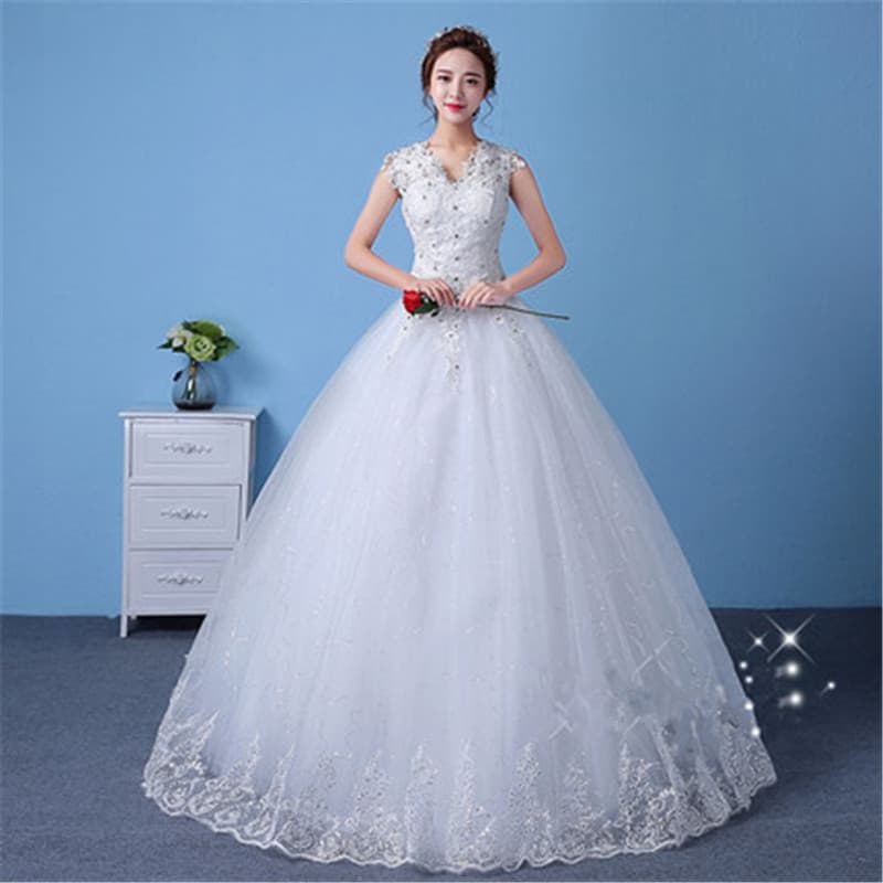 Vestido de novia elegante con mangas y falda vuelo