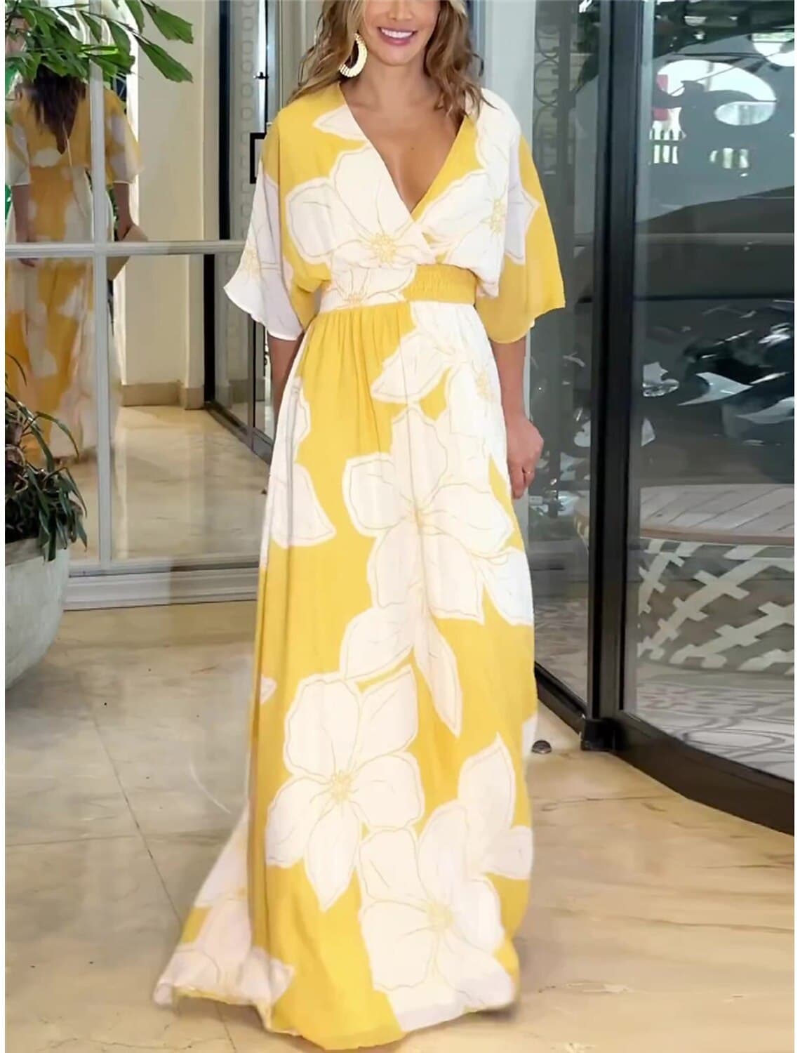 Vestido largo con cuello V y mangas murciélago