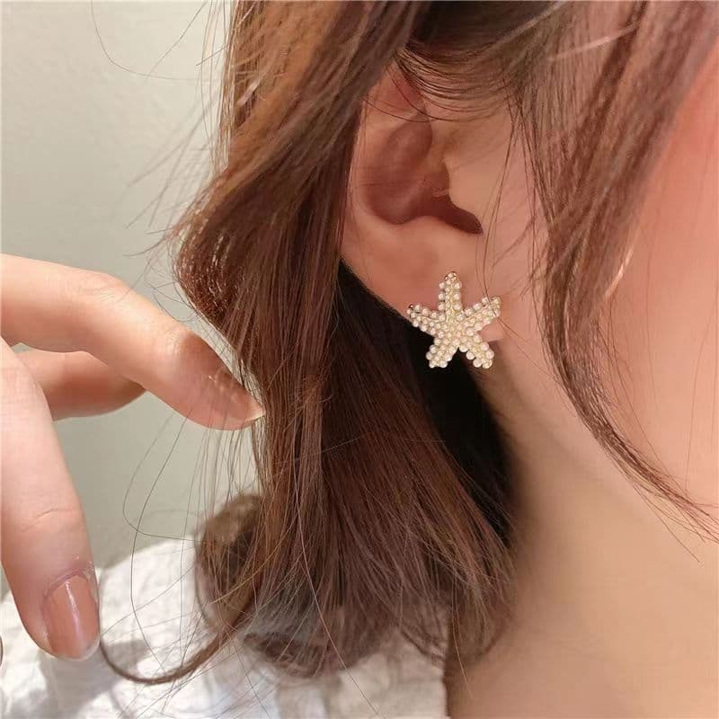 Aretes de estrella de mar, diseño delicado y femenino