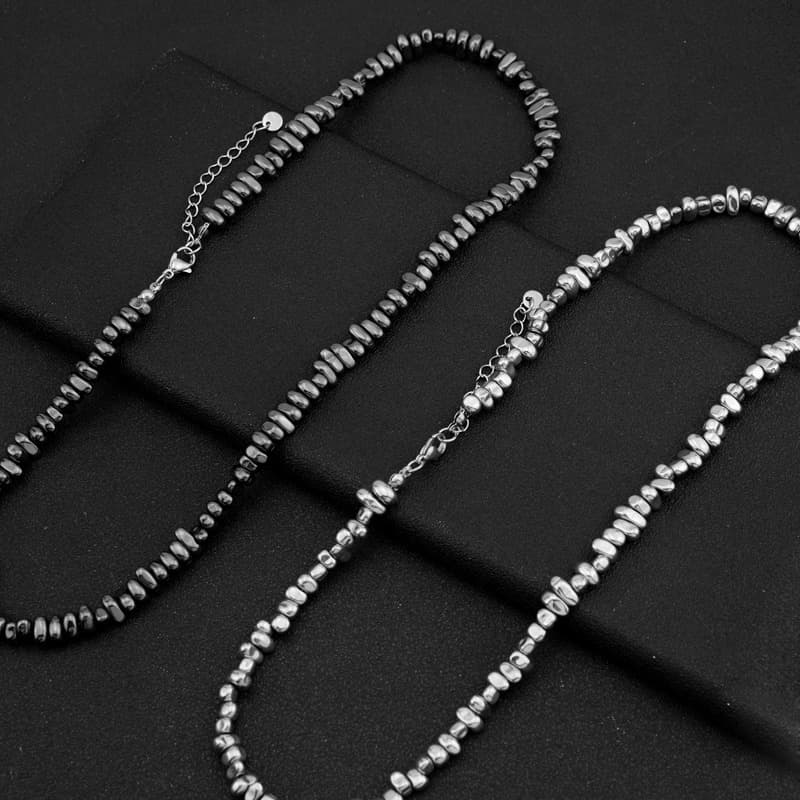 Collar de acero titanio con cadena torcida asimétrica
