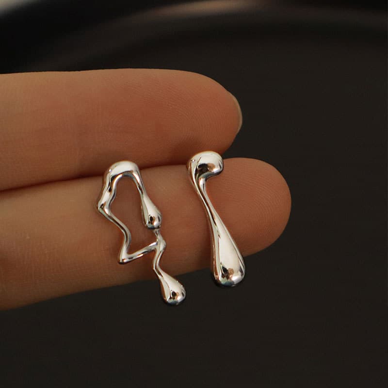 Aretes asimétricos lava, diseño exclusivo lujoso