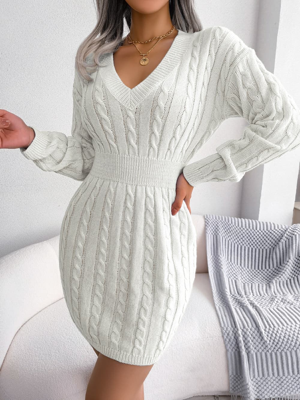 Vestido suéter con detalle texturizado en cadera