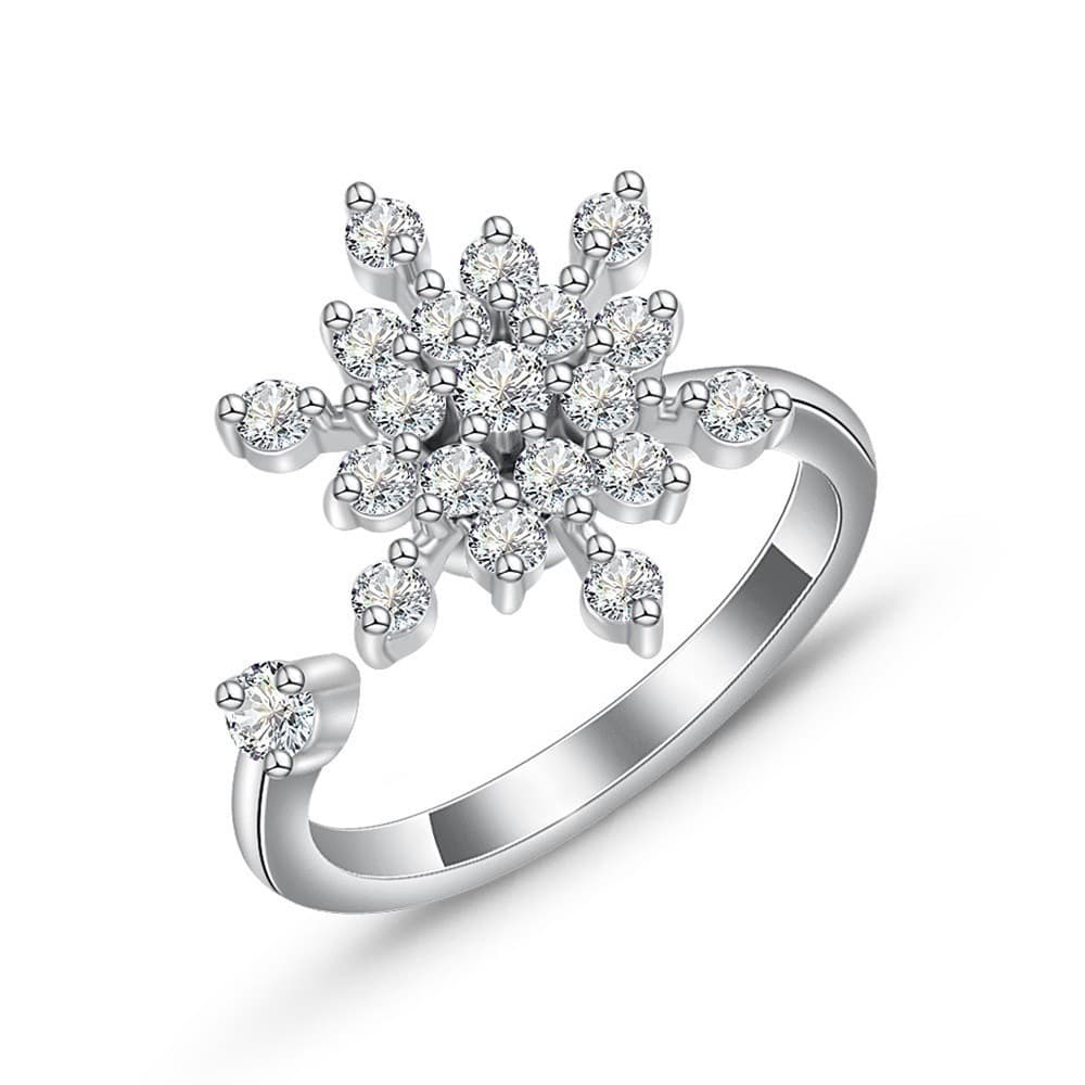 Anillo ajustable con copo de nieve rotatorio