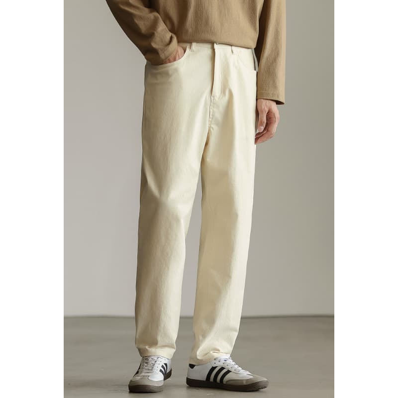 Pantalones denim stretch recortados de color sólido