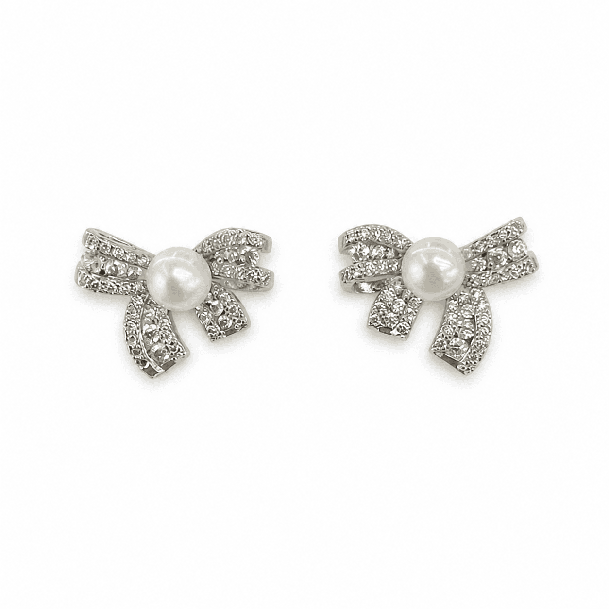 Aretes de perla con moño de diamante