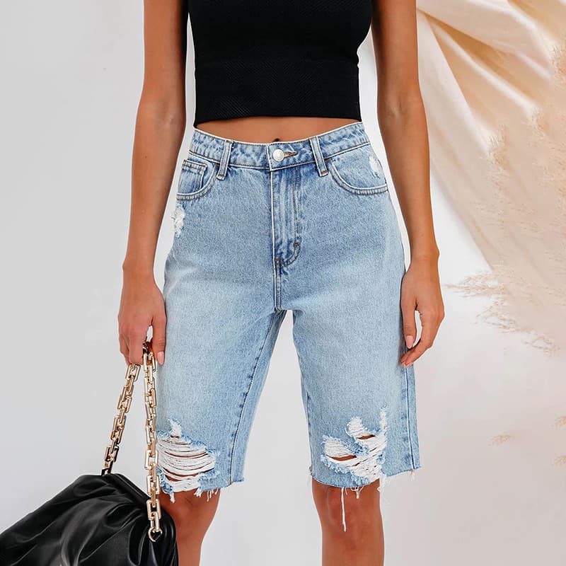 Pantalones jeans rotos de cintura media para mujer