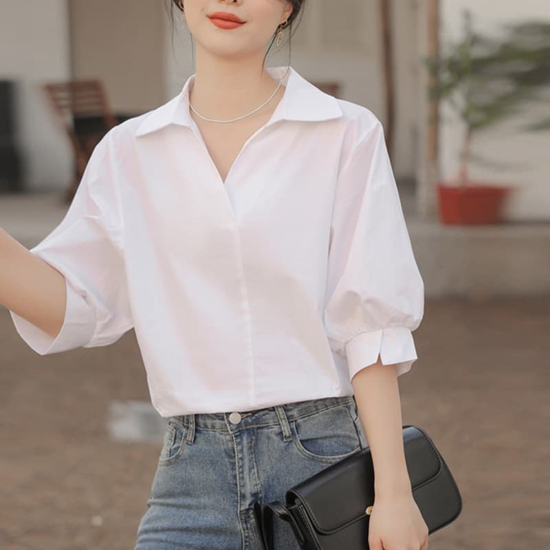 Blusa algodón con solapas cuello en V manga farol 3/4