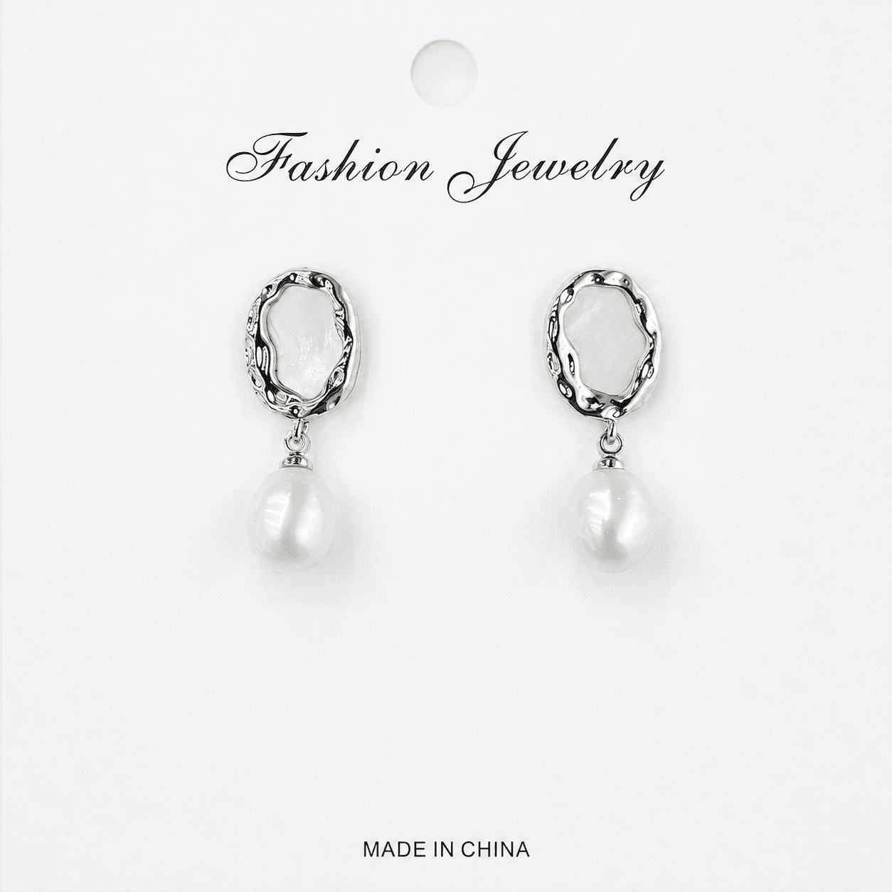 Aretes de perla madre con marco plateado vintage