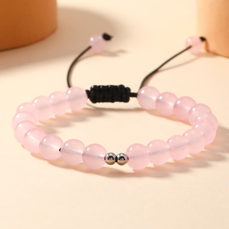 Pulsera de cristal con borla y diseño elegante
