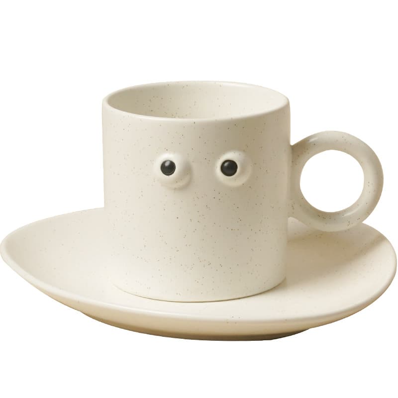 Taza cerámica nórdica con decoración de ojos grandes