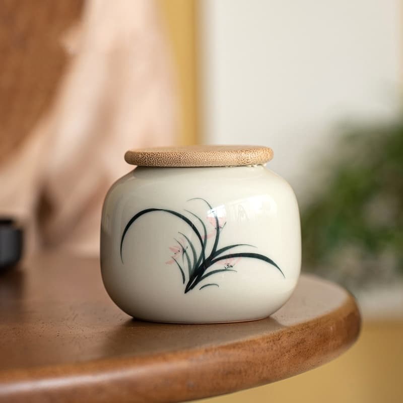 Frasco de cerámica para té con diseño de orquídea