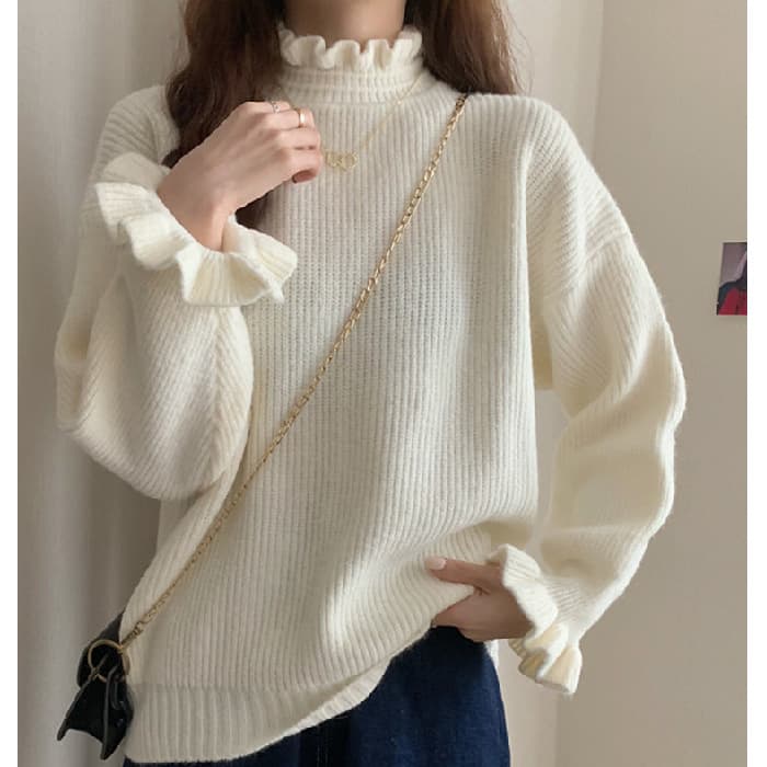 Blusa tejida cuello mitad alto con ajuste slim