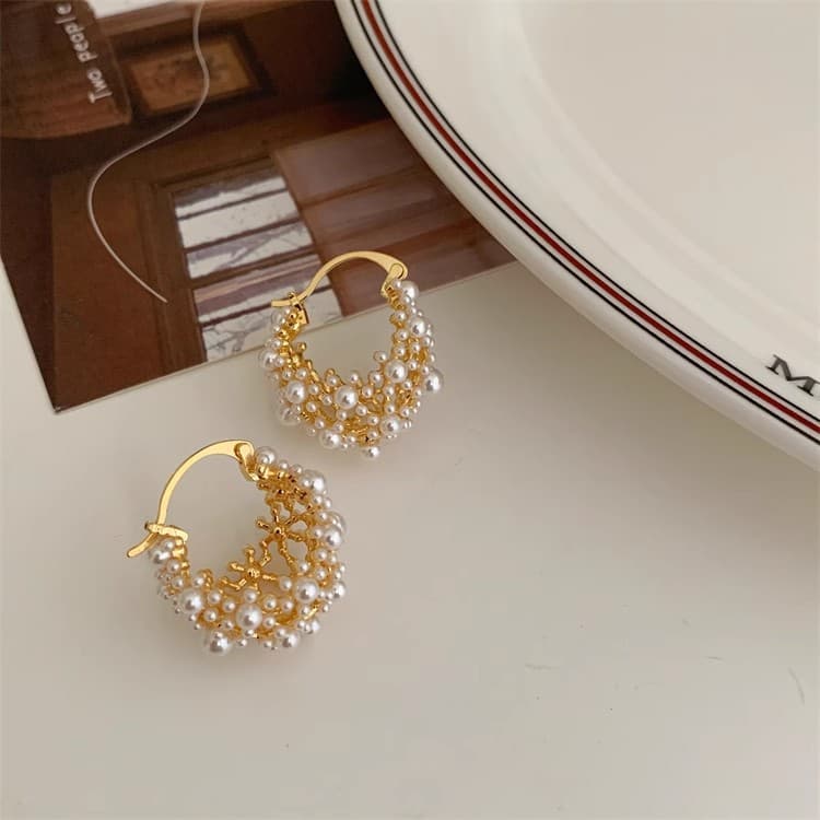 Aretes perla hueco tridimensional