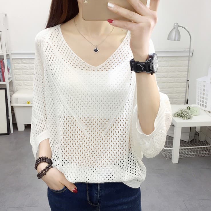 Blusa tejida suelta de manga murciélago con calado
