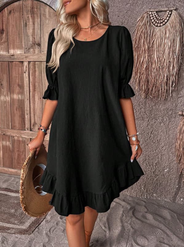 Vestido holgado con mangas cortas y volantes