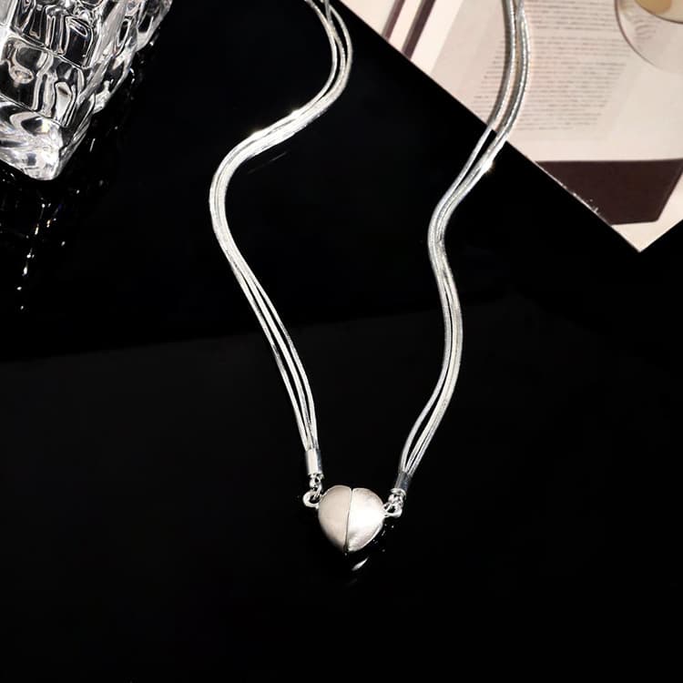 Collar magnético con colgante de corazón, diseño de lujo