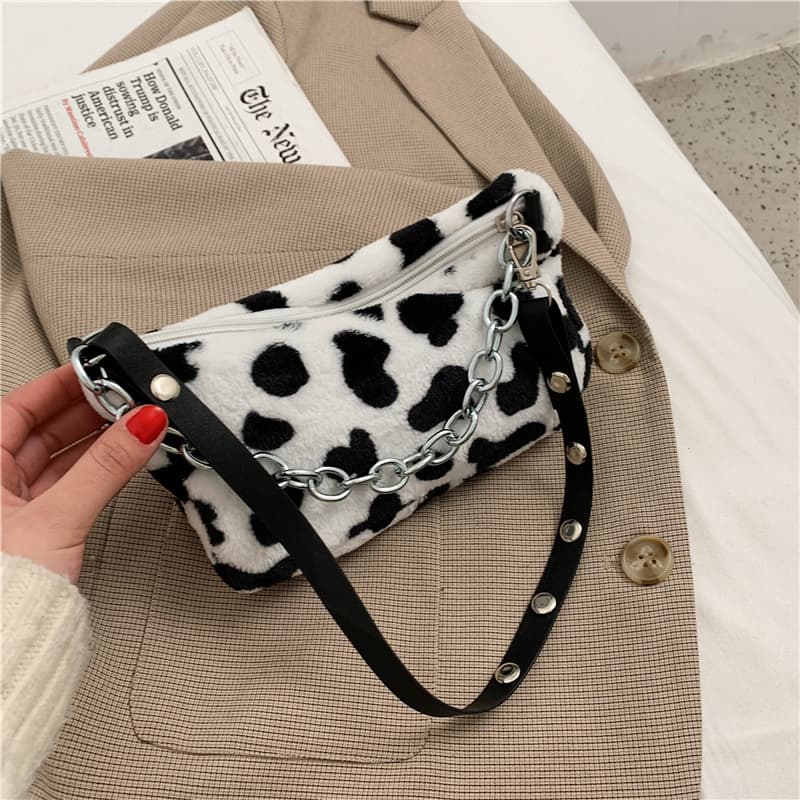Bolsa para mujer con patrón animal y cadena decorativa