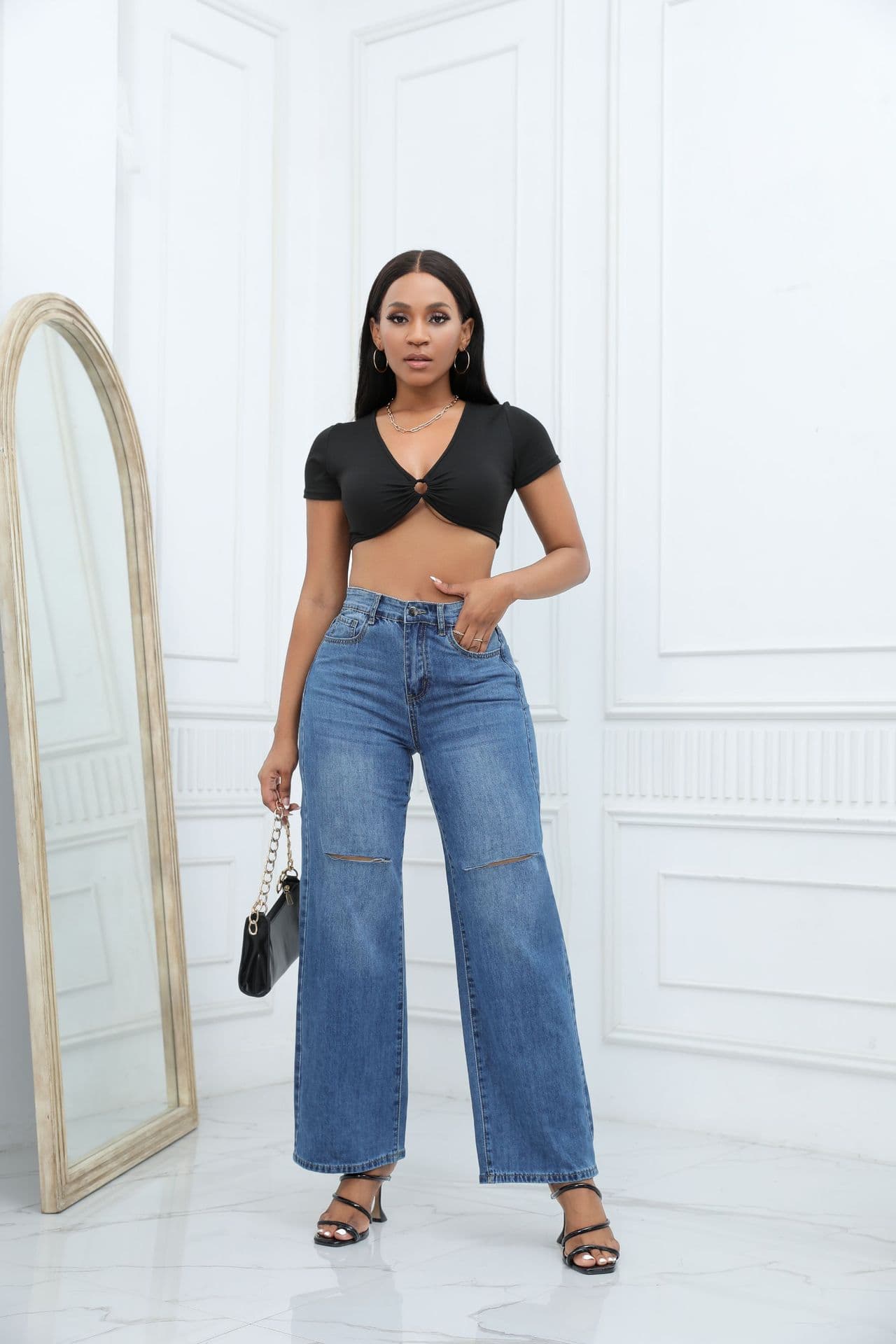Pantalones jean ancho rotos elegantes para mujer