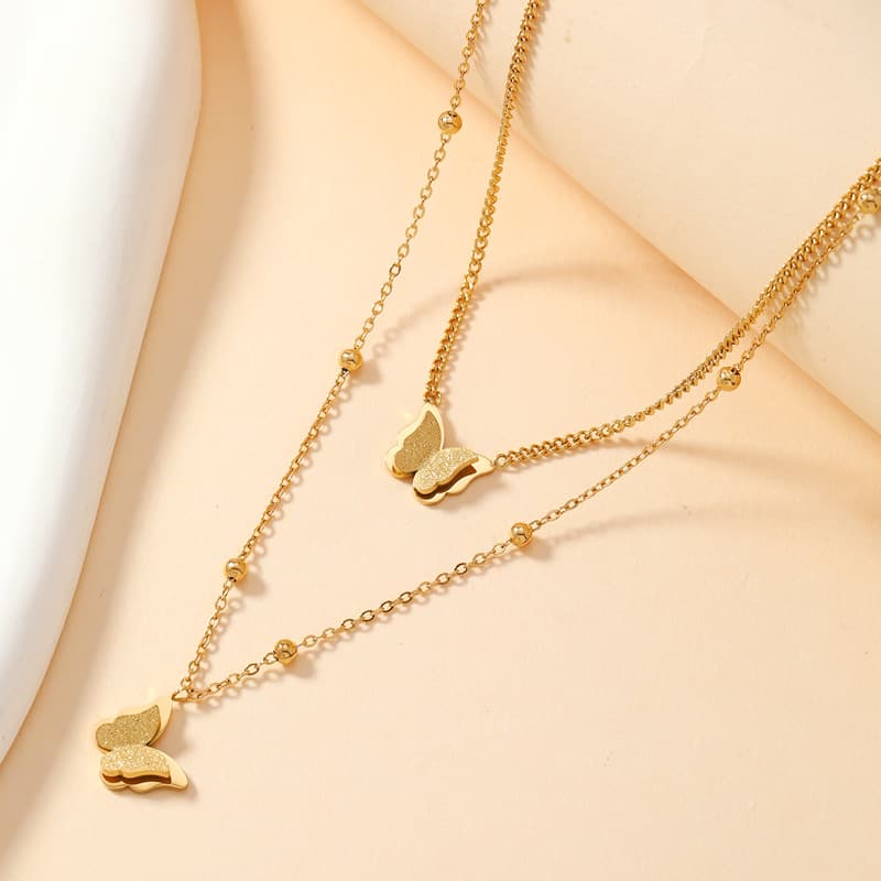 Collar mariposa doble capa acero inoxidable