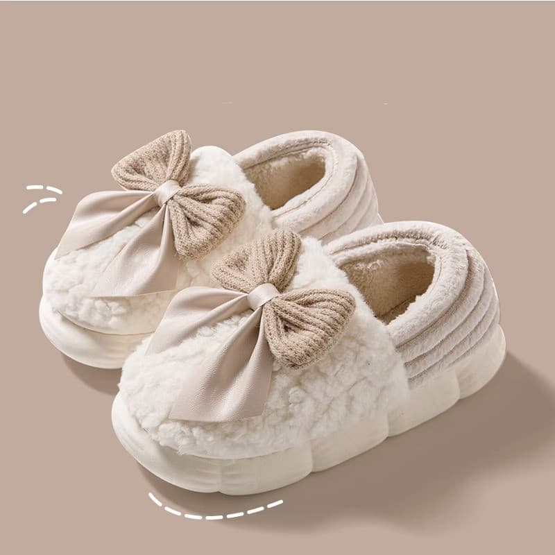 Pantuflas con gran moño suave y suela gruesa