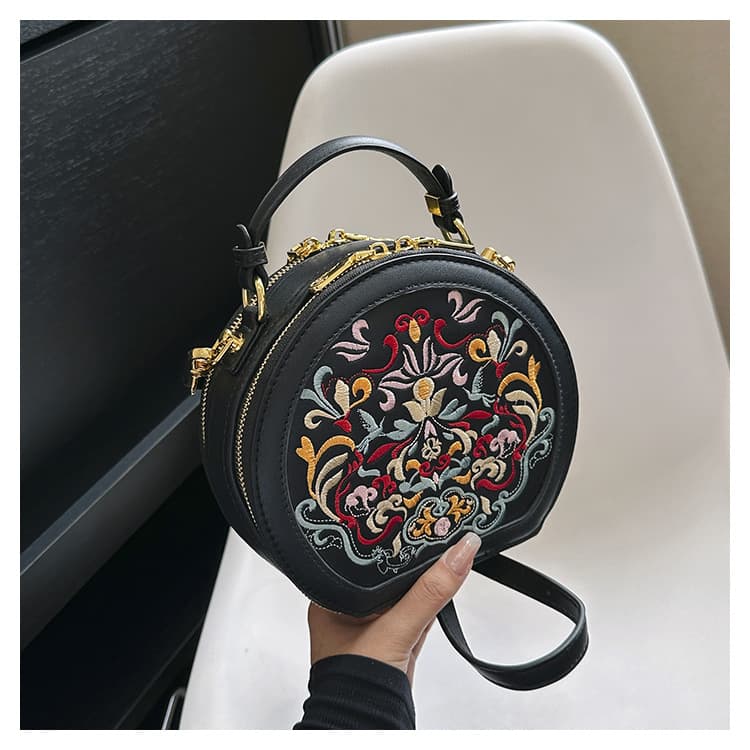 Bolsa mensajera con bordado estilo asiático