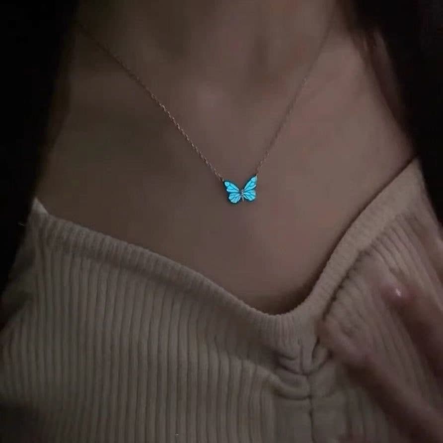 Collar y pulsera luminosa con mariposa fosforescente