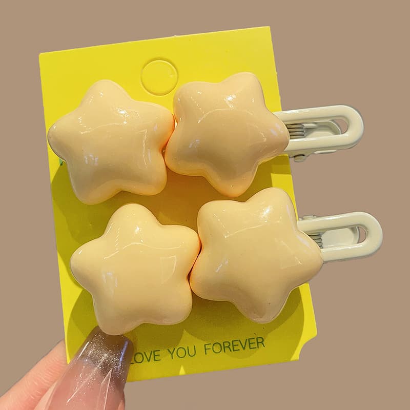 Pasador de cabello con forma de estrella amarilla