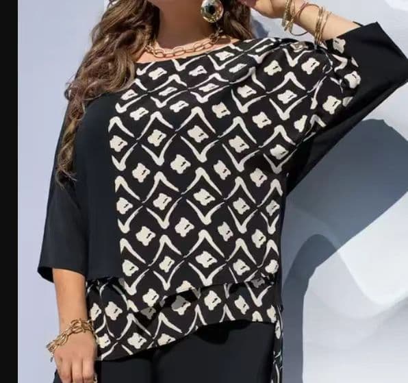 Blusa estampada cuello redondo media manga
