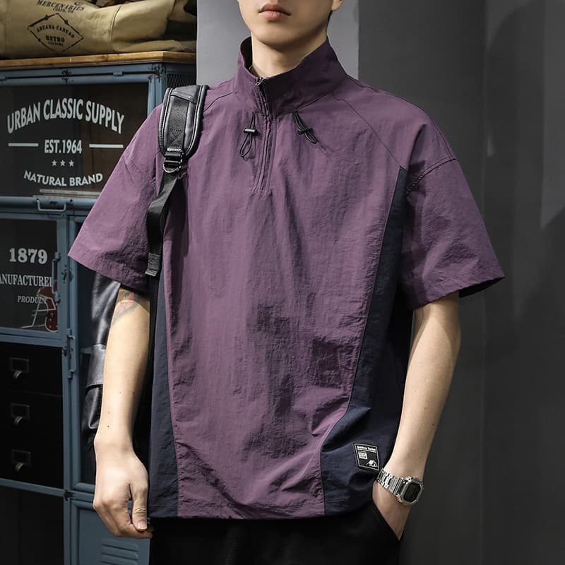 Camisa de cuello alto con cierre media cremallera