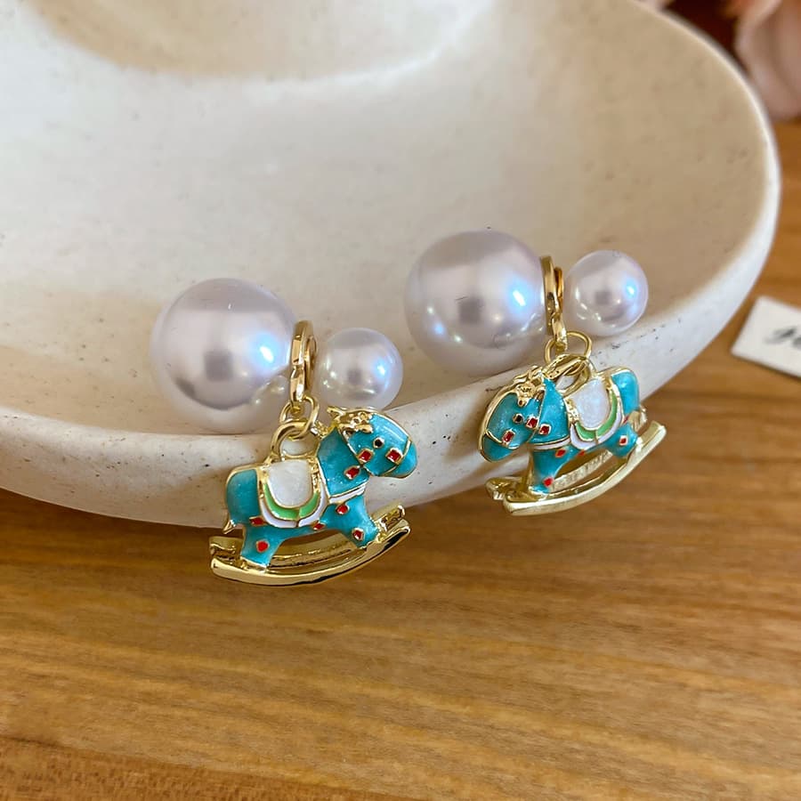 Aretes de perla caballo con poste plata
