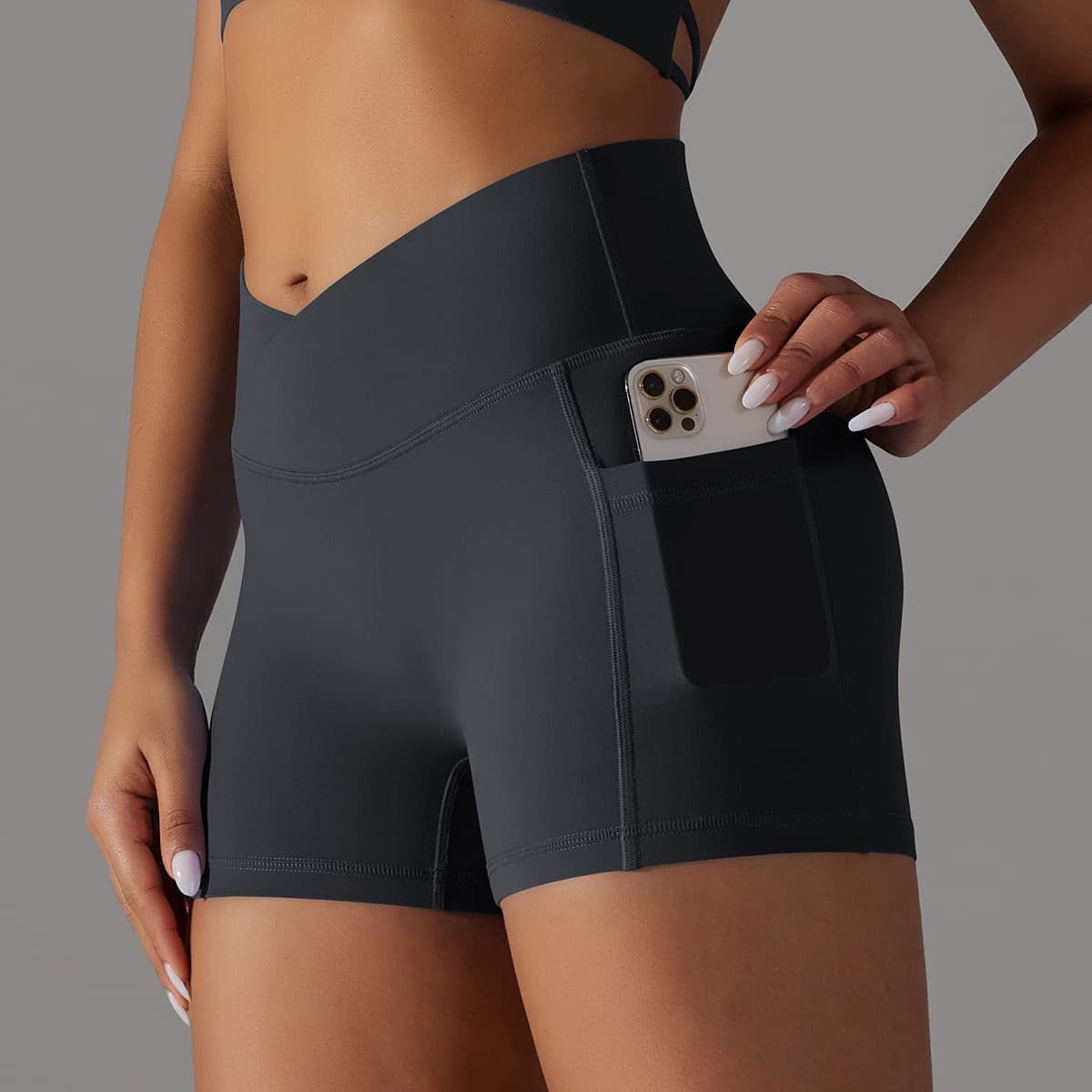 Pantalones cortos de yoga con bolsillo para teléfono