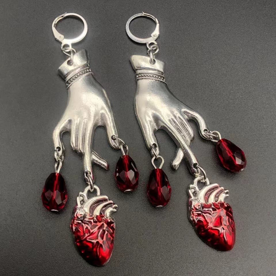Aretes vintage de gota con rubí y borla