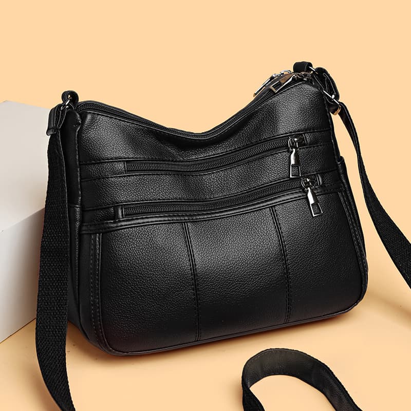 Bolsa de hombro con múltiples compartimentos