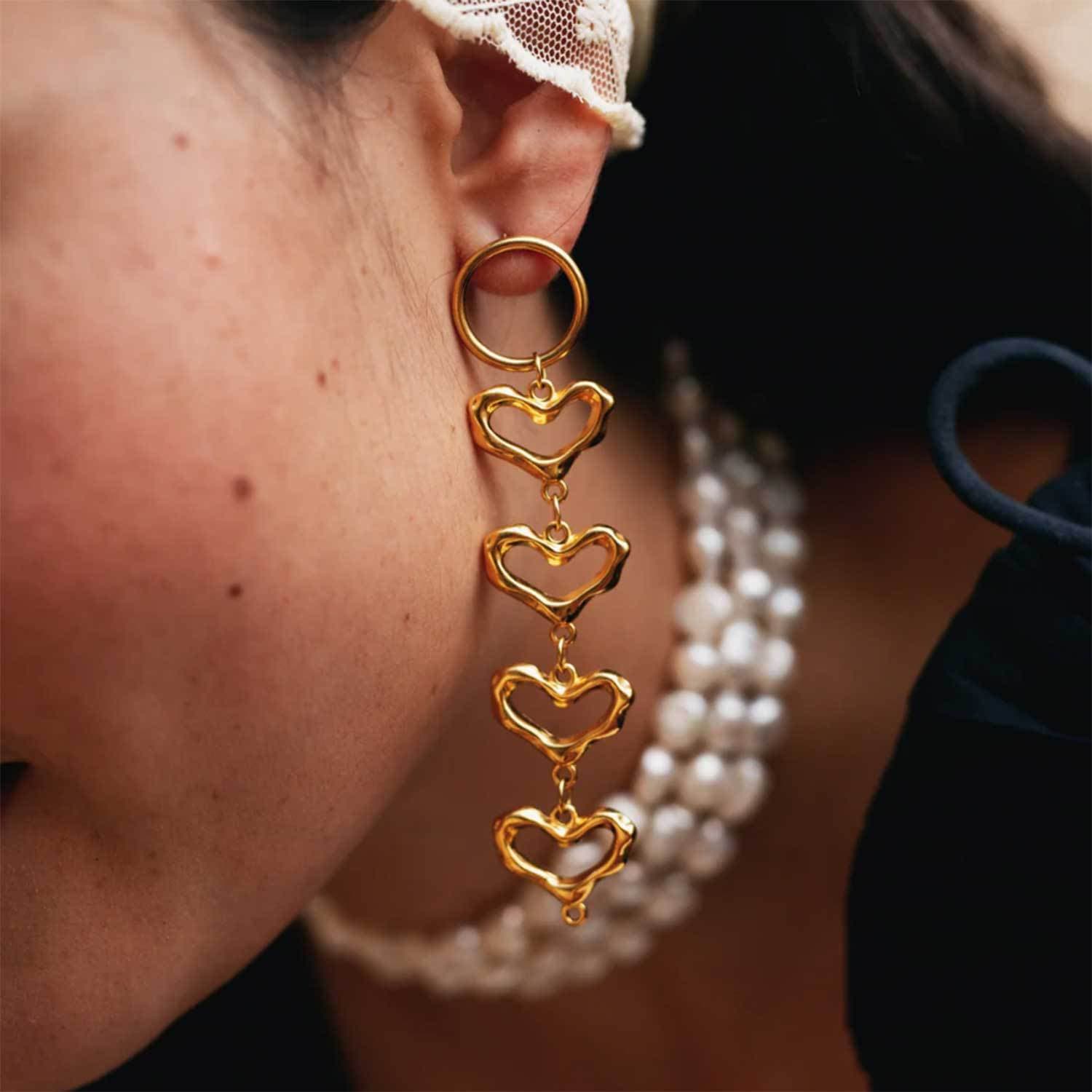 Aretes de corazón hueco en estilo retro y exagerado