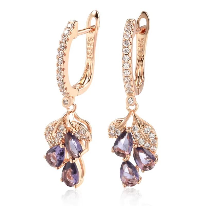 Aretes de oro rosa estilo geométrico