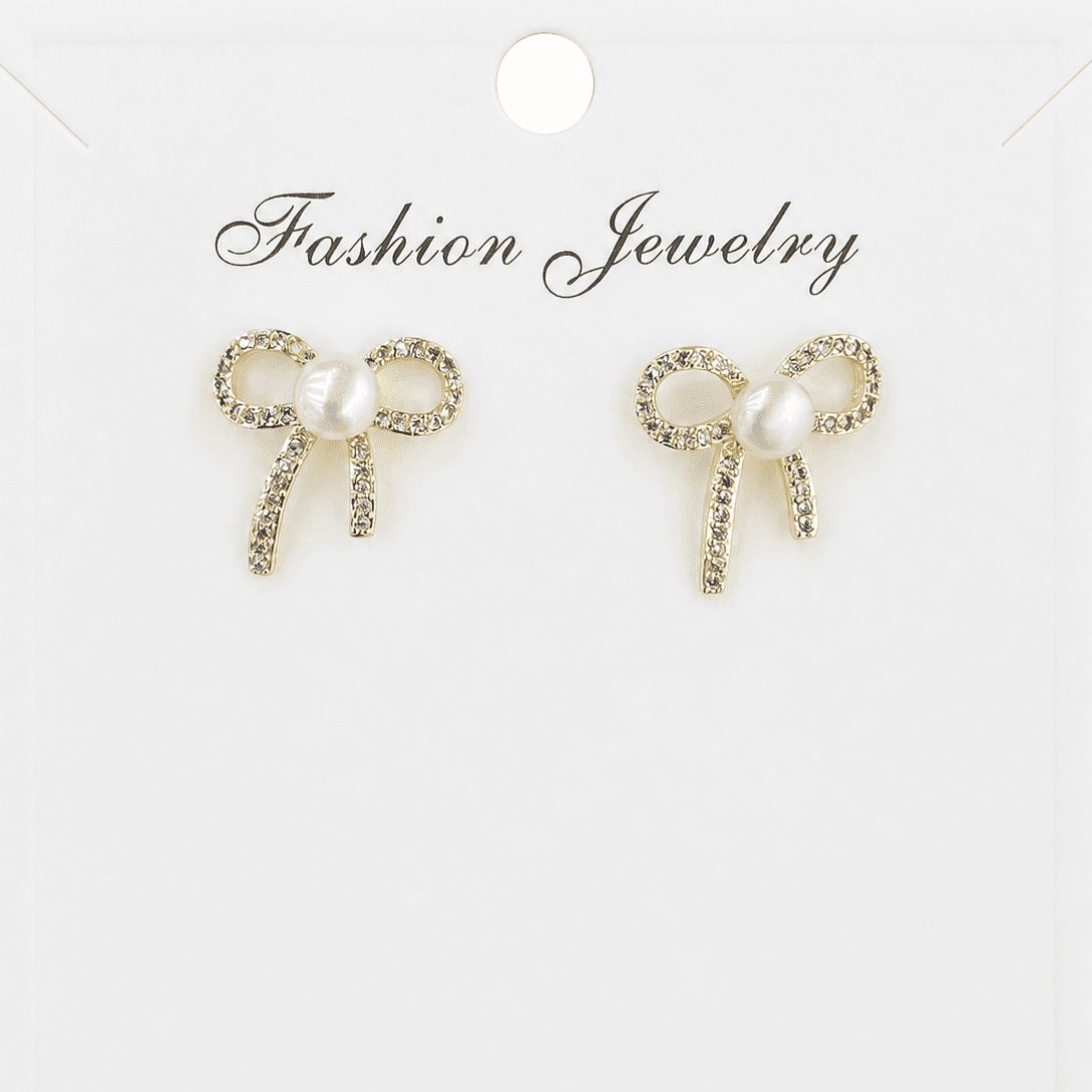 Aretes de perla con moño brillante