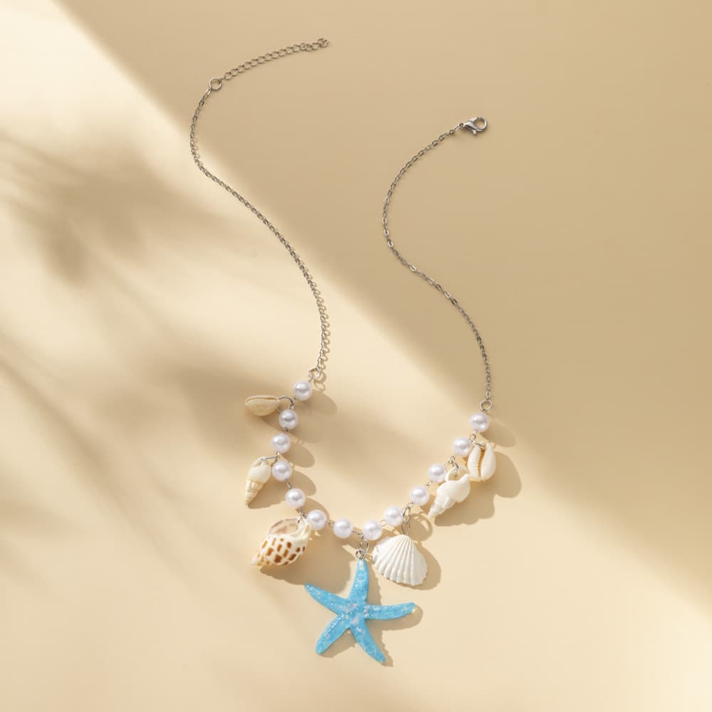 Collar de perla, concha y estrella de mar