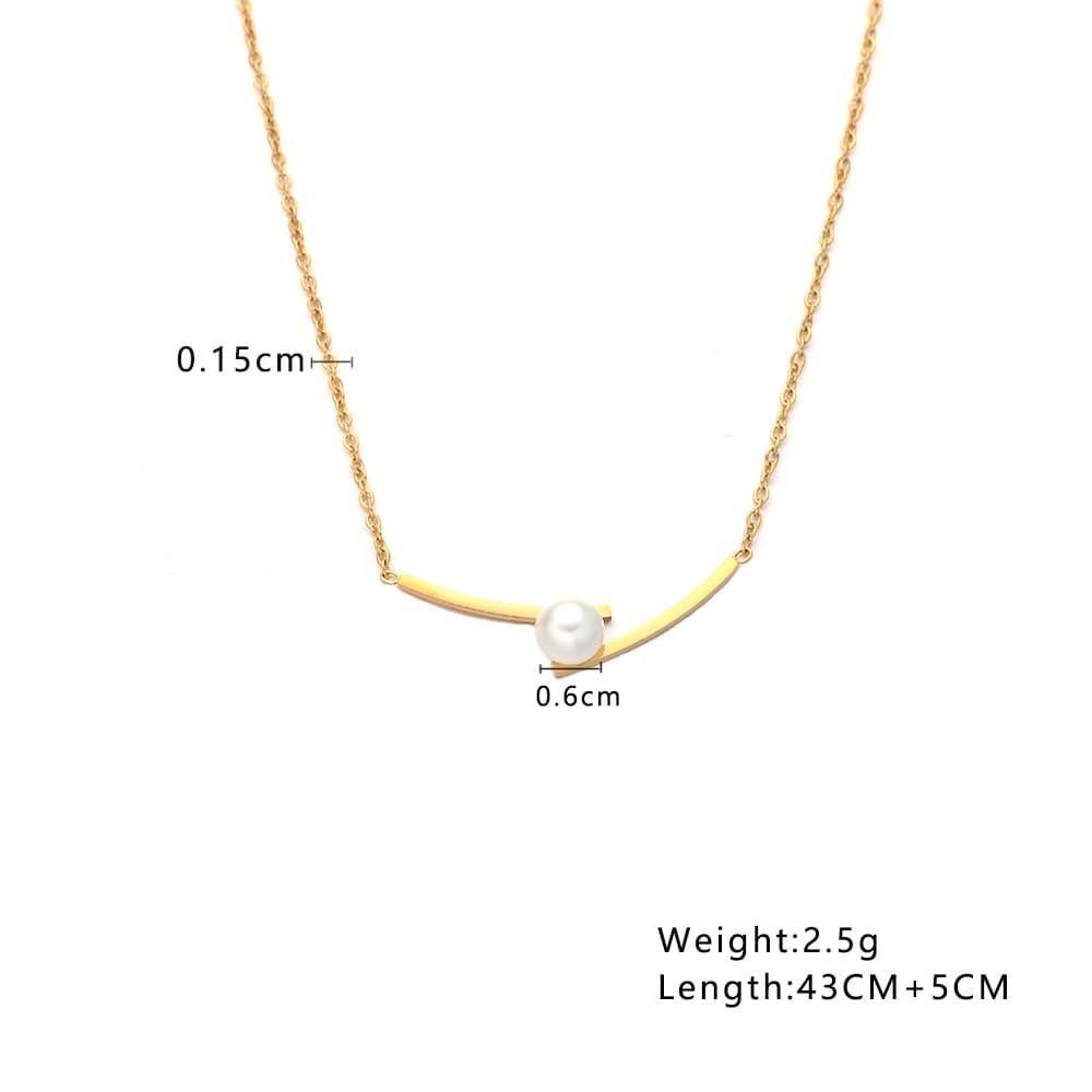 Collar de acero titanio con dije de perla chapado en oro