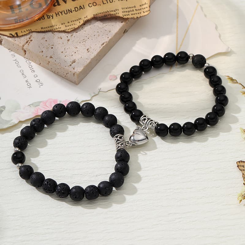 Pulsera de pareja en piedra con diseño de corazón