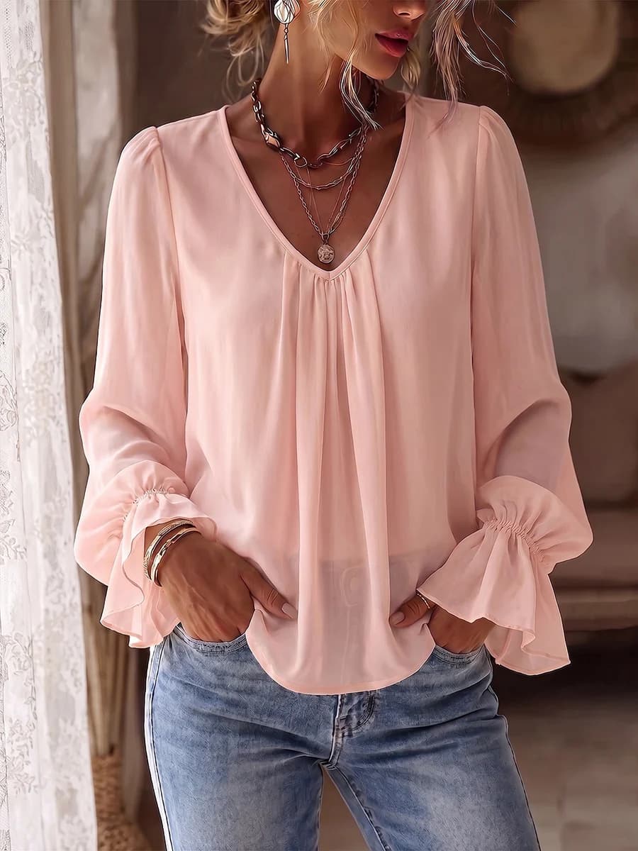 Blusa con pliegues cuello en V manga larga suelta