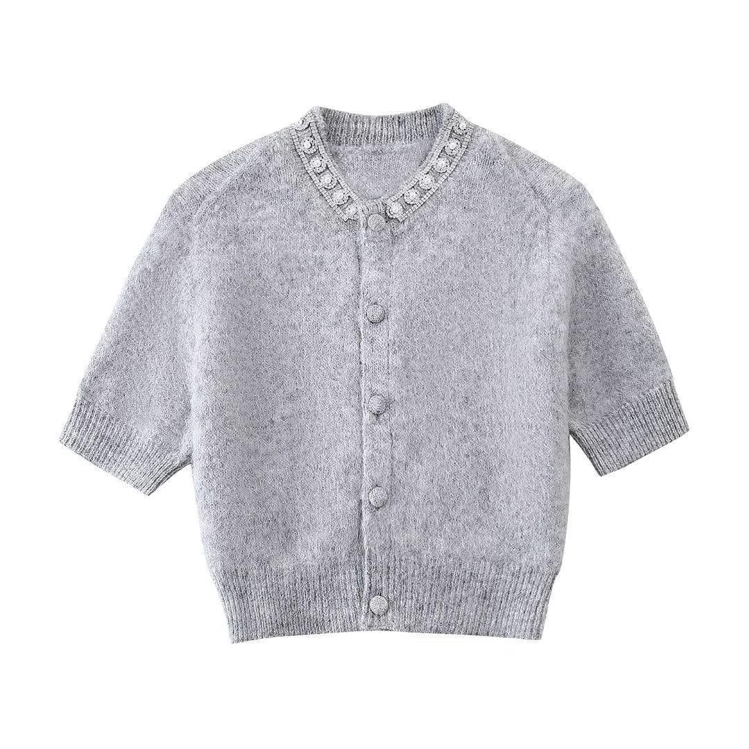 Cardigan corto suave de punto