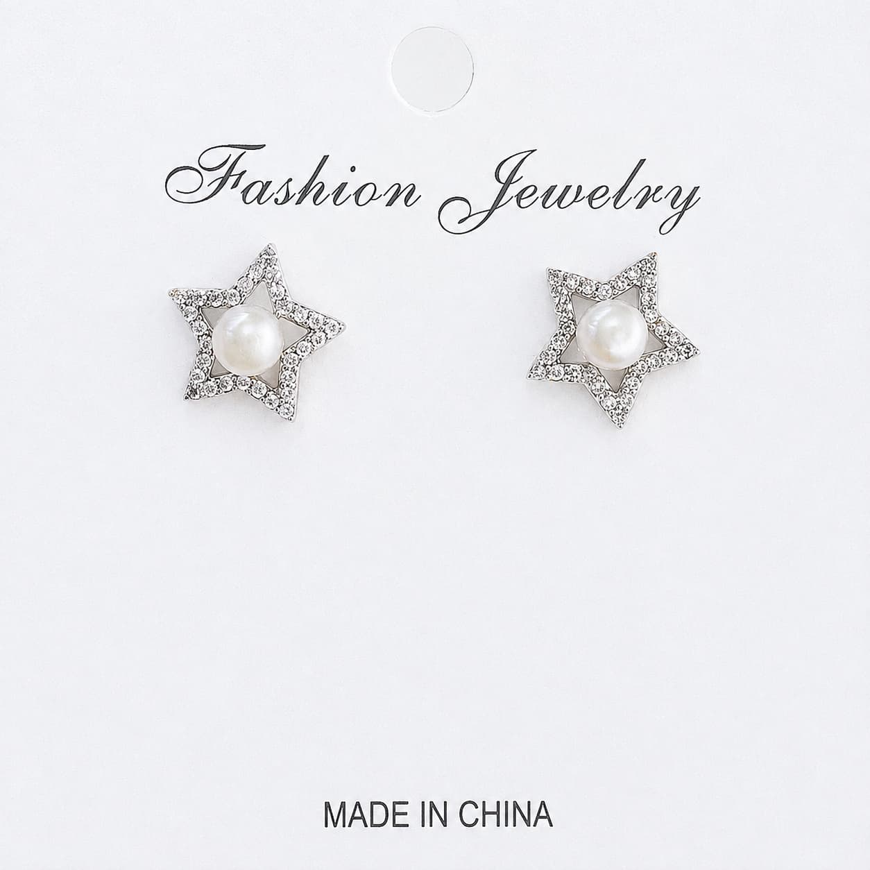 Aretes de perlas con estrella plateada y circonia