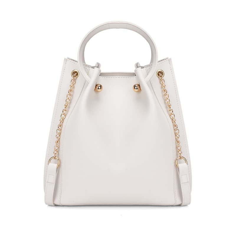 Bolsa de lujo tipo cubo con acabado elegante