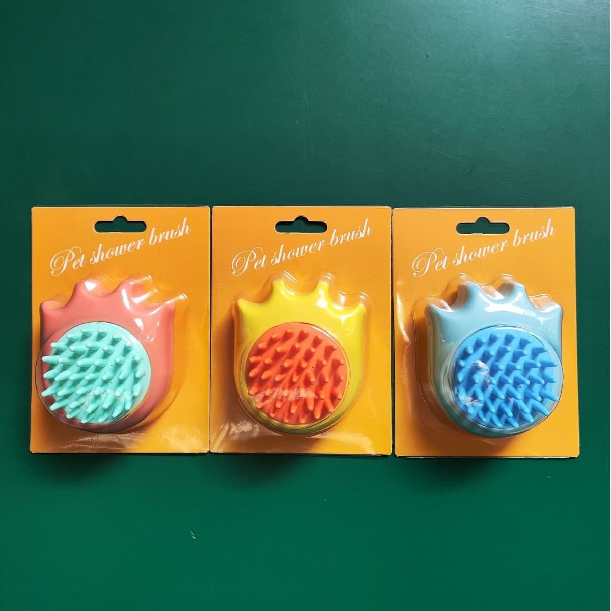 Cepillo de baño masajeador de patita para mascotas