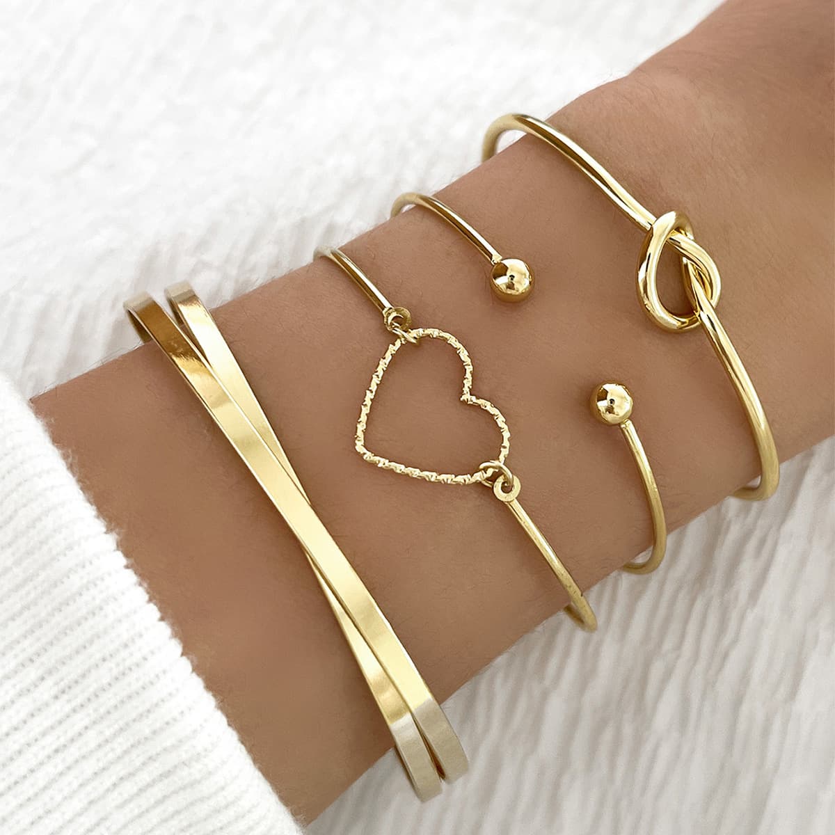 Juego de pulseras doradas vintage con corazón y cristales