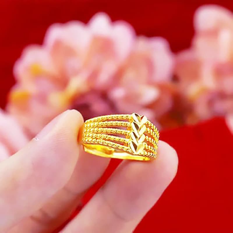 Anillo abierto con corazón y notas musicales