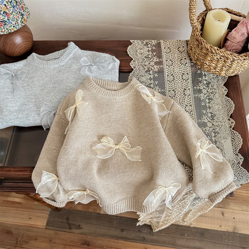 Suéter niño tejido con moño moda infantil